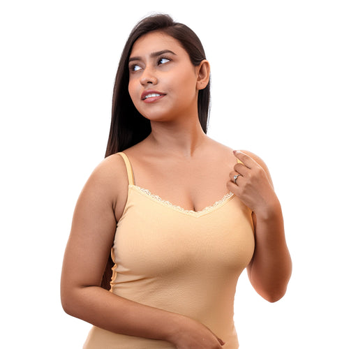 Woman wearing a beige Charmella Camisole