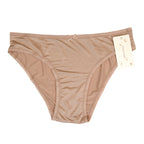 Charmella Invisible Panty with a tag on a white background