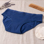 Charmella Blue Period Panty on a textured surface.
