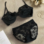 Black lace Lingerie Set on a textured surface.
