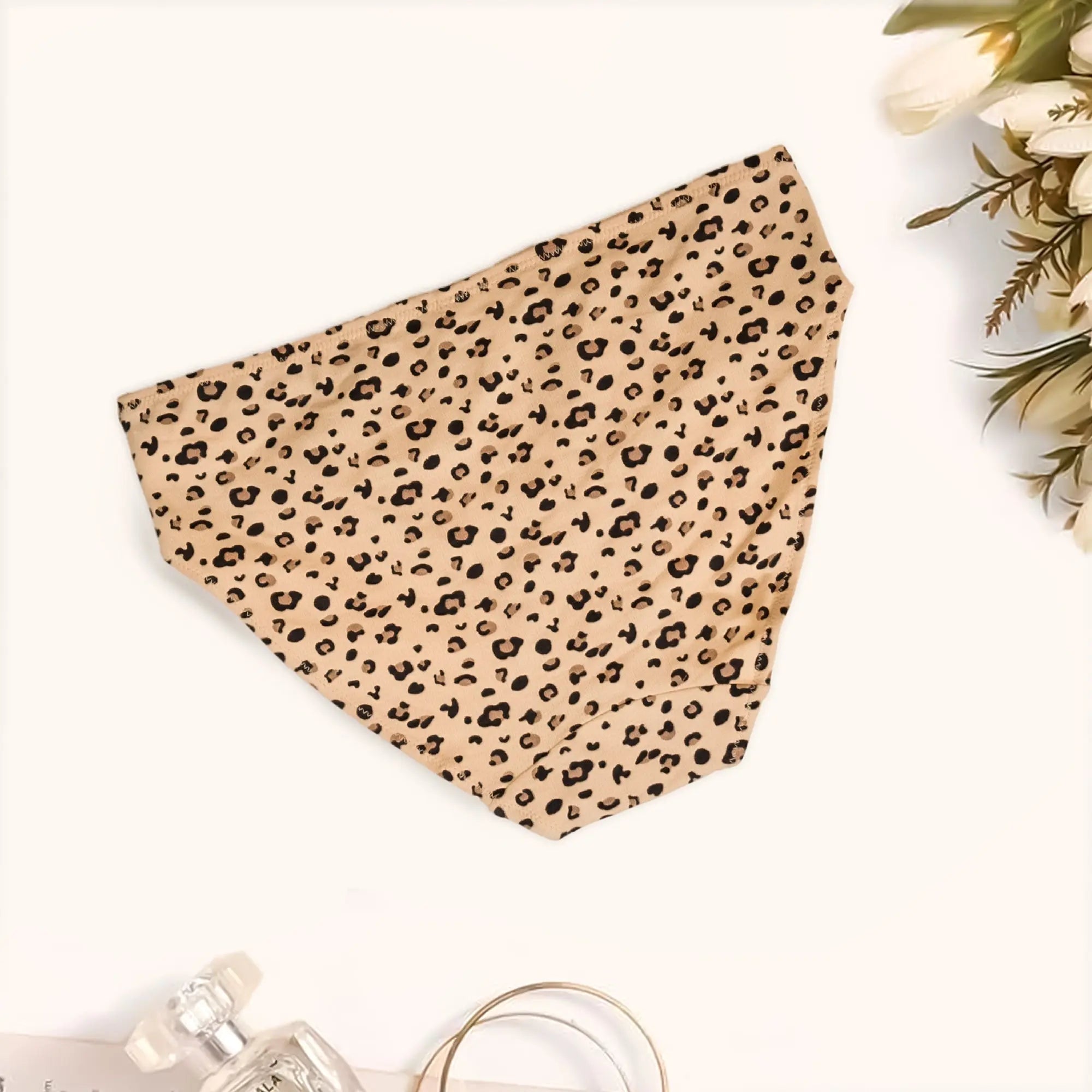 Leopard print panty on a white surface.